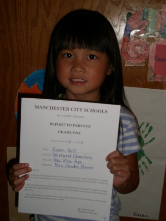 Kasen and her first report card of 1st grade